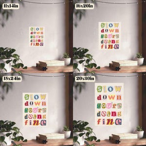 May include: A printable poster with the text "Slow down you're doing fine" in colorful, cut-out letters on a cream background. The poster is shown in four different sizes: 11x14 inches, 16x20 inches, 18x24 inches, and 20x30 inches.