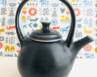Blue porcelain tea pot by Raging Bowl Pottery