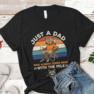 Personalized Dad Shirt, “Just A Dad Who Always Comes Back With The Milk” Racoon Design, Casual Wear, Father’s Day Gift