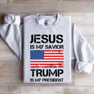 a t - shirt that says jesus is my savor trump is my president