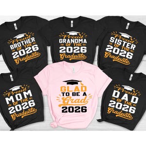 A collection of six t-shirts with graduation-themed designs, including text and graphics, arranged in two rows of three.