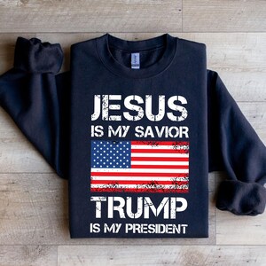 a t - shirt that says jesus is my savor trump is my president