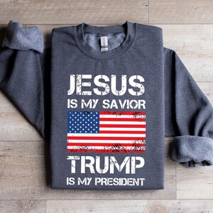a t - shirt that says jesus is my savor trump is my president