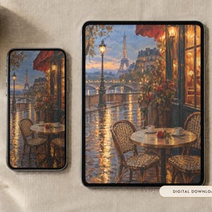 May include: A smartphone and a tablet displaying an oil painting of a Parisian cafe scene at dusk, featuring the Eiffel Tower in the distance, a round table with two chairs, a single red rose, and warm glowing streetlights reflecting on wet pavement.