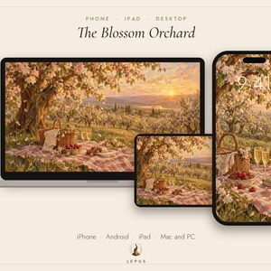 May include: A digital display set featuring a laptop, tablet, and smartphone, each showing a landscape painting titled The Blossom Orchard. The artwork depicts a picnic with a basket, strawberries, and glasses under blooming trees.