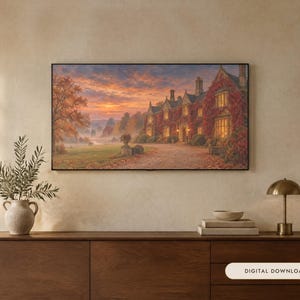 Op de afbeelding: Een rechthoekige wandkunstprint met een groot stenen landhuis bedekt met herfstbladeren bij zonsondergang. De sc&egrave;ne bevat een grindpad, gouden bomen en een mistig landschap onder een levendige oranje en paarse lucht. De tekst luidt Digital Download.