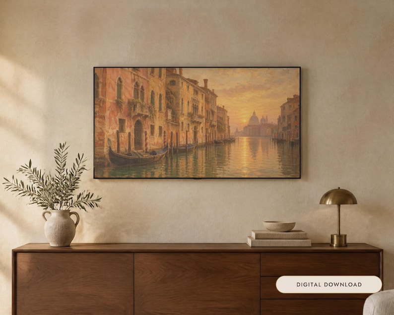 May include: A rectangular framed wall art print depicting a Venetian canal scene at sunset with warm orange and golden hues, featuring historic buildings and a gondola on the water. The text "DIGITAL DOWNLOAD" is visible in the lower right corner.