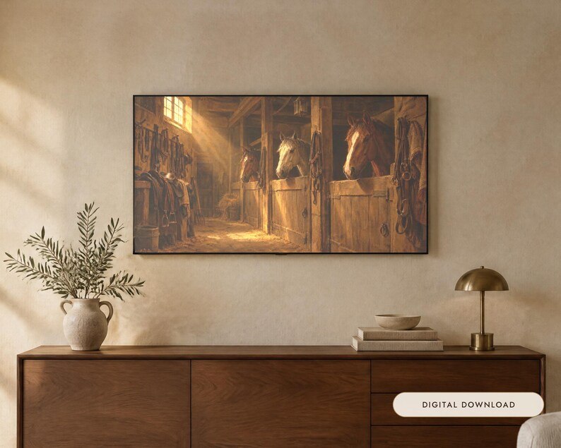 May include: A rectangular wall art print depicting the interior of a wooden horse stable with three horses looking out from their stalls. Sunlight streams through a window, illuminating the dusty air and wooden textures of the barn interior.