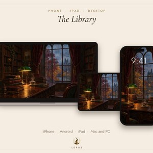 May include: A digital wallpaper set titled The Library displayed on a laptop, tablet, and smartphone. The image features a dark, cozy study with a desk, stacks of books, a green banker lamp, and a large window overlooking an autumn landscape.