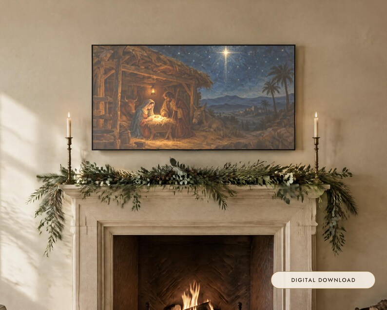 May include: A rectangular wall art print depicting a nativity scene with figures in a stable under a bright star, displayed above a fireplace mantel decorated with green pine garland and two tall brass candlesticks with lit candles.