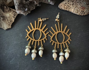 Evil eye brass and glass dangle earrings with Jobs tears and carved pearl teardrops artisan studio glass earrings