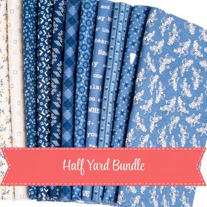 May include: A collection of folded fabric pieces in various shades of blue and cream, featuring patterns such as geometric shapes, stripes, floral motifs, and text. A coral-coloured banner across the bottom displays the text Half Yard Bundle.