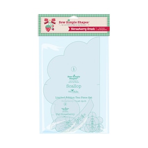 May include: A clear plastic package containing sewing templates. The package features the text "Sew Simple Shapes" and "Strawberry Crush." The templates are for a scallop and big strawberry quilt design. Includes 10 templates.
