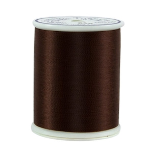 May include: A spool of brown embroidery thread with the text "Cotton Embroidery Thread 100% Cotton 640 Yards" on the label.