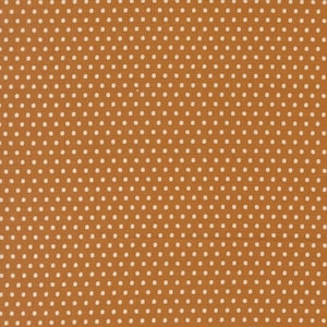 May include: A close-up of a fabric featuring a repeating pattern of white polka dots on a golden-brown background. The dots are evenly spaced, creating a textured look. This fabric is suitable for sewing and crafting projects.