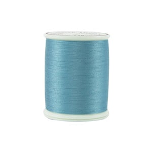 May include: A spool of light blue thread.