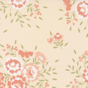 May include: A cream-colored fabric with a delicate floral pattern. The flowers are pink and white with green leaves and stems.