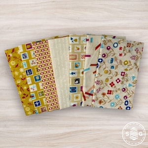 May include: A white ceramic mug with a black handle and the text "But First, Coffee" in a black, bold font. The mug is on a white surface. The mug is likely 11 ounces.