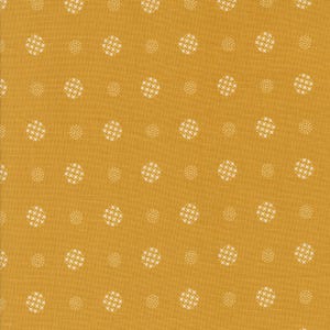 May include: A yellow fabric with a repeating pattern of white circles with a small white star pattern inside.