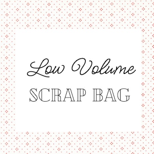 May include: A white label with a red polka dot border. The label says "Low Volume Scrap Bag" in black text.
