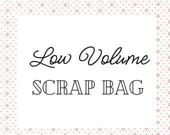 May include: A white label with a red polka dot border. The label says "Low Volume Scrap Bag" in black text.