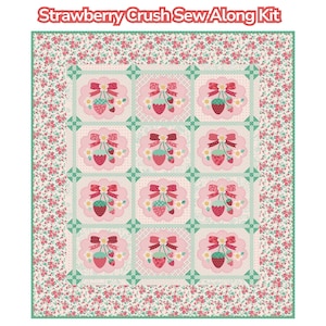 May include: A patchwork quilt with a floral border and a repeating pattern of strawberries and bows. The quilt is primarily pink, red, and green, with the text "Strawberry Crush Sew Along Kit" at the top.