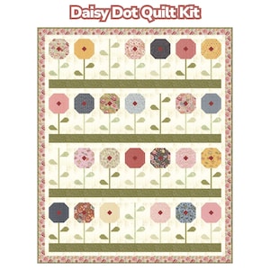May include: A Daisy Dot Quilt Kit featuring a floral design. The quilt showcases rows of octagonal flower shapes in various colors and patterns, including pink, yellow, and blue, set against a cream background. The quilt is bordered with a floral pattern.