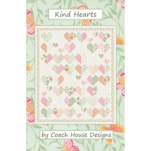 May include: A quilt pattern titled "Kind Hearts" by Coach House Designs. The quilt design features a repeating pattern of heart shapes in shades of pink, green, and peach, set against a white background. The border is decorated with floral and butterfly motifs.
