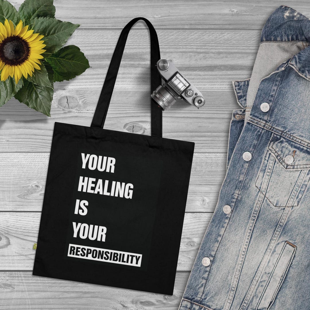 Tan and multi-color there’s beauty in your self-confidence organic cotton tote bag. main image 1