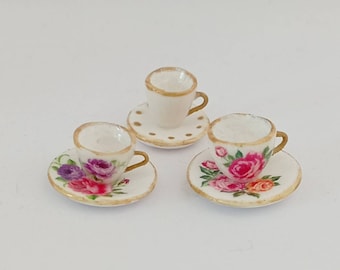 1:12 scale Alice in wonderland inspired set of three teacups.