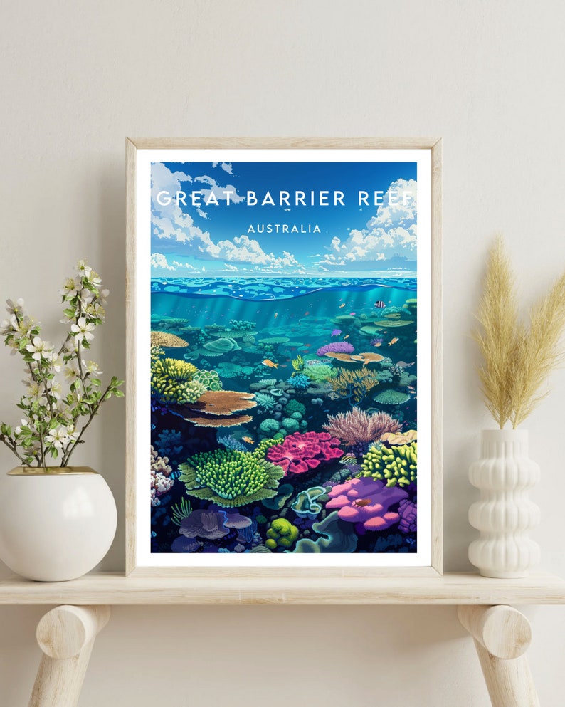 May include: A framed print of the Great Barrier Reef in Australia. The print shows a vibrant underwater scene with colorful coral and fish.