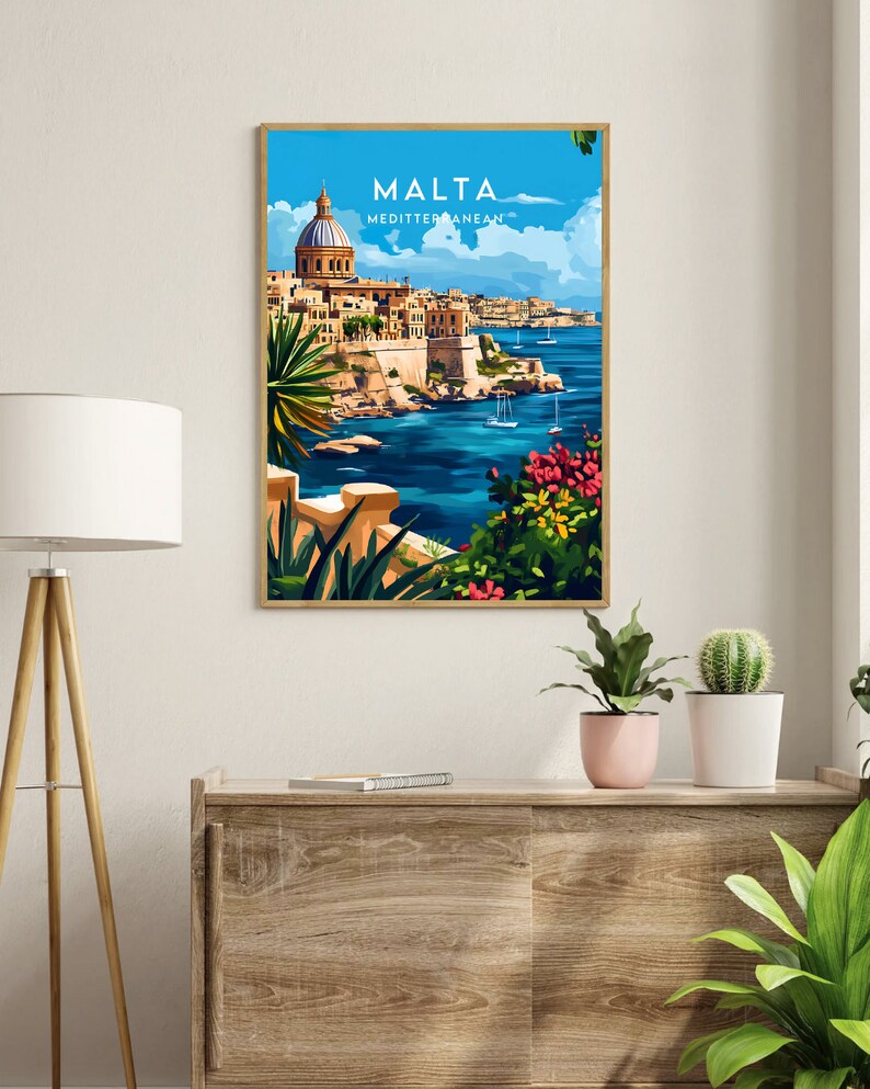 May include: A vintage travel poster featuring a colorful illustration of a cityscape with a church dome, a body of water, and lush greenery. The poster has the text "MALTA MEDITTERANEAN" at the top.