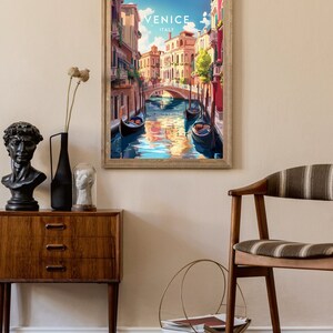 May include: A vintage travel poster featuring a colorful illustration of a canal in Venice, Italy. The poster has the text "Venice, Italy" at the top.