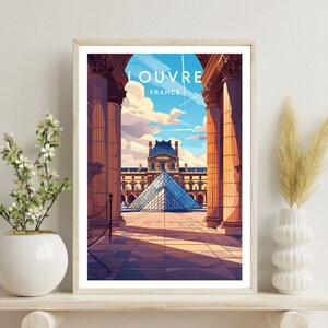 May include: A framed illustration of the Louvre Museum in Paris, France. The image shows the iconic glass pyramid in the courtyard, with the text "Louvre" and "France" above it.