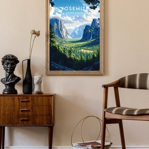 May include: A framed poster featuring a vintage travel illustration of Yosemite National Park in California, United States. The poster depicts a scenic view of the valley with mountains, trees, and a waterfall. The text "Yosemite, United States" is printed at the top of the poster.