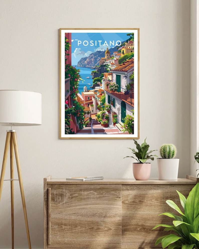 May include: A colorful illustration of Positano, Italy, with a view of the Mediterranean Sea and the town's colorful buildings. The text "Positano, Italy" is at the top of the image.