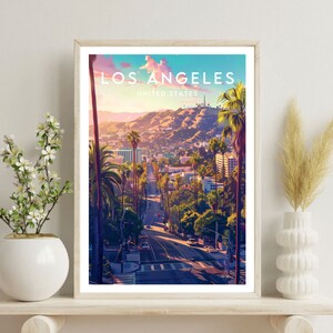 May include: A vintage travel poster featuring a scenic view of Los Angeles, California, with palm trees and a cityscape in the background. The poster has the text "Los Angeles, United States" at the top.