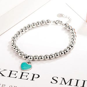 ハートチャーム付きシルバービーズブレスレット