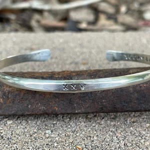 Sterling Silver 25th Anniversary Bracelet: Roman Numeral XXV Cuff