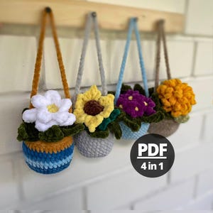 Può includere: Quattro vasi di fiori appesi all'uncinetto con fiori di diversi colori. I vasi sono fatti di filato e hanno una combinazione di colori blu, grigio, marrone e arancione. I fiori sono bianchi, gialli, viola e arancioni. L'immagine include il testo "PDF 4 in 1".