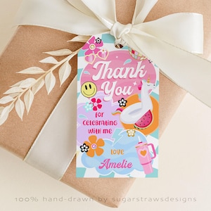 May include: A gift tag with a colorful design featuring the text "Thank You" and "for celebrating with me". The tag includes a smiley face, flowers, a unicorn float, and a pink tumbler. The tag is tied to a wrapped gift with a white ribbon.