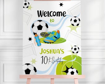 May include: Welcome to Joshua's 10th Birthday sign with a soccer ball, soccer cleats, and a soccer net design. The sign is white with green and blue accents.