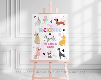 May include: A pink easel displays a welcome sign for a dog-themed birthday party. The sign features cartoon dogs, paw prints, balloons, and the text "Welcome to Elizabeth's 2nd Birthday Pawty."