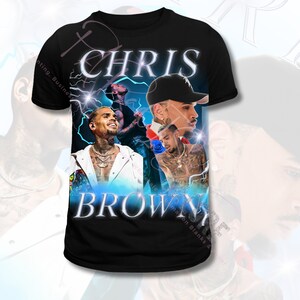 May include: Black t-shirt with a graphic print of Chris Brown. The graphic features multiple images of Chris Brown with lightning bolts and the text "CHRIS BROWN" in blue and white.