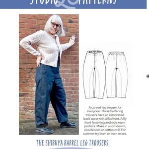 May include: Image of a woman wearing a beige cardigan and dark blue barrel leg trousers. The image includes a pattern illustration of the trousers and text that reads "THE SHIBUYA BARREL LEG TROUSERS".