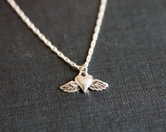 Winged Heart Necklace in Sterling Silver - Tiny silver heart Milagro charm. Sweet Valentine's Day sweetheart gift. Let love take flight.