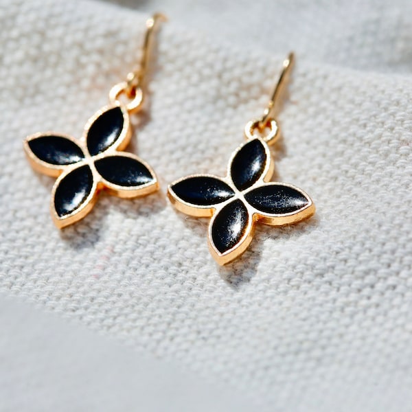 Black Flower Earrings. 14K gold filled ear wires with black enameled four pointed petals. Simple dainty black and gold earrings. Quatrefoil.