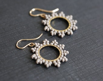 Soft gray sun burst Earrings. Handwoven beaded earrings with 14K gold fill ear wires. Modern beadwork earrings, neutral bead hoop earrings.