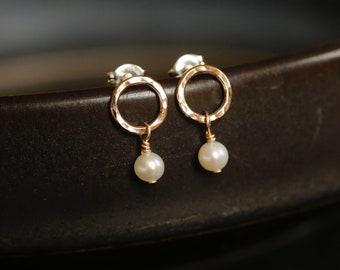 Minimalist pearl hoops. Tiny Gold open hoop studs. Hammered 14K gold filled and white genuine pearls. Front facing gold hoops. Great gift.