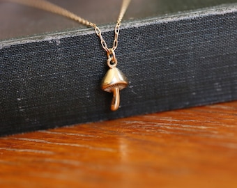 Golden Mushroom Necklace - Mushroom charm necklace. Gardencore Toadstool Necklace. Mushroom Pendant. In 14K gold filled and solid bronze.